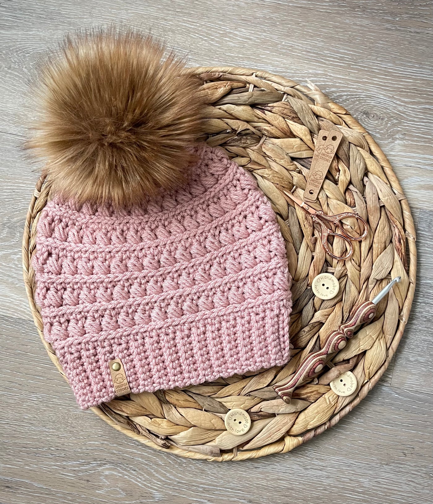 Dusty Pink Crocheted Beanie with faux fur pom pom
