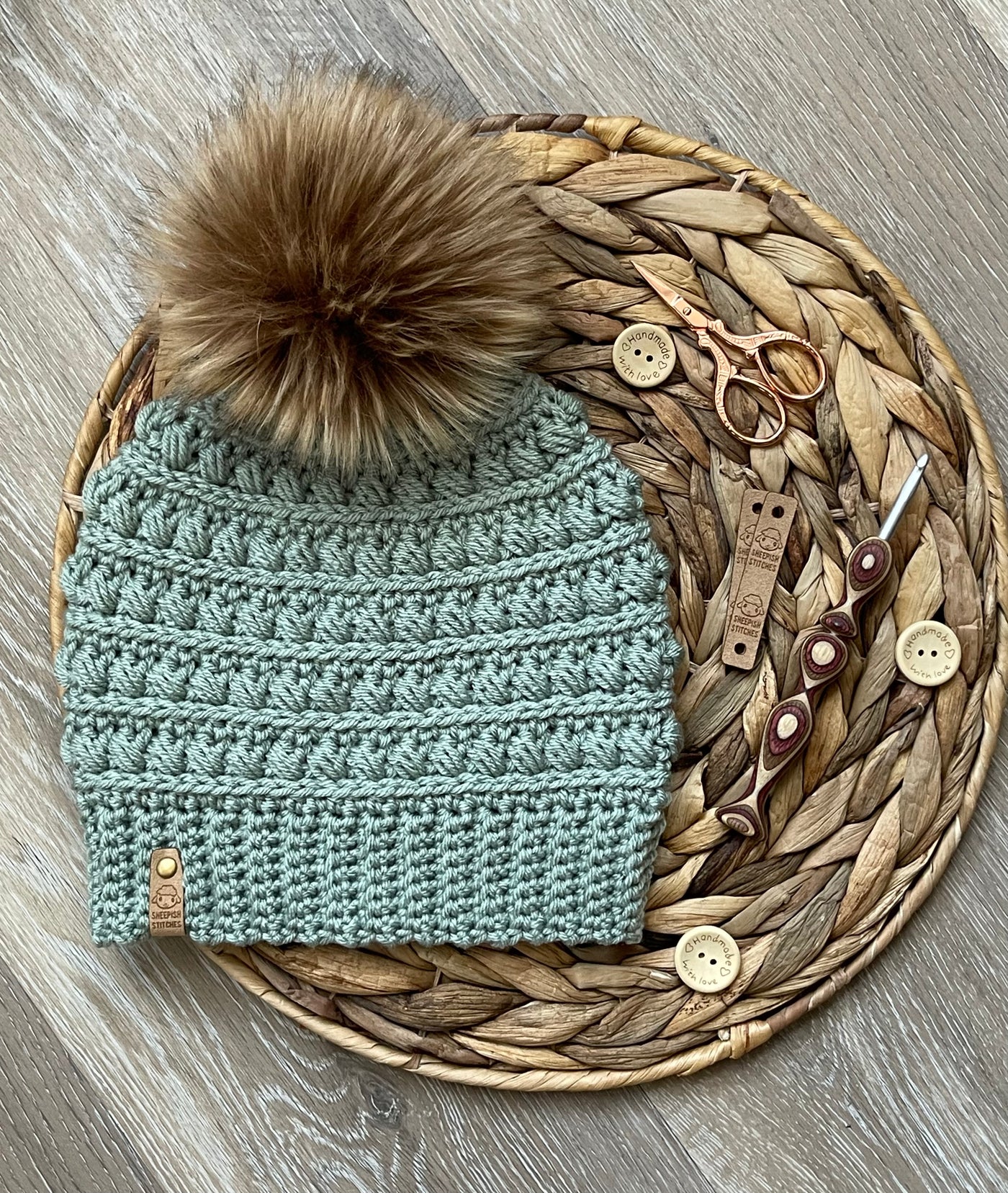 Dusty Blue Crocheted Beanie with faux fur pom pom